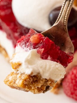 layers of cranberry salad with pretzel crust