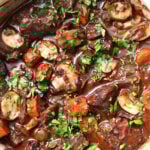 a dutch oven with beef stew