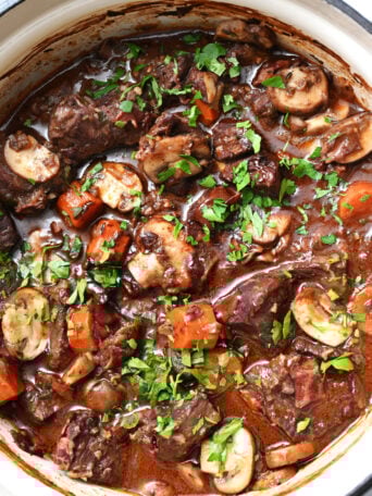 a dutch oven with beef stew