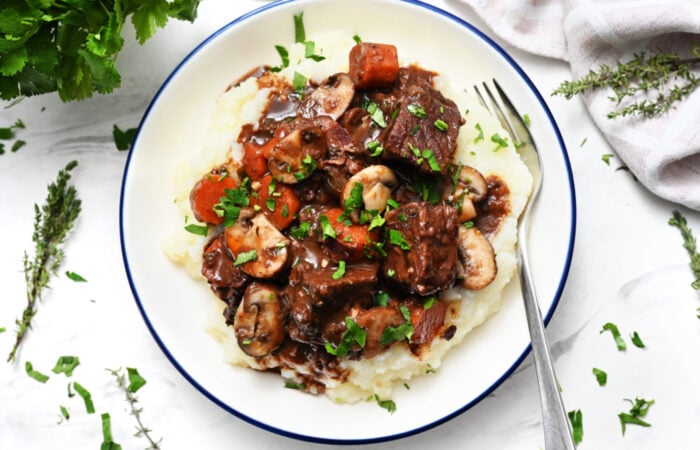 a plate of Beef Bourguignon (French Red-Wine Beef Stew)