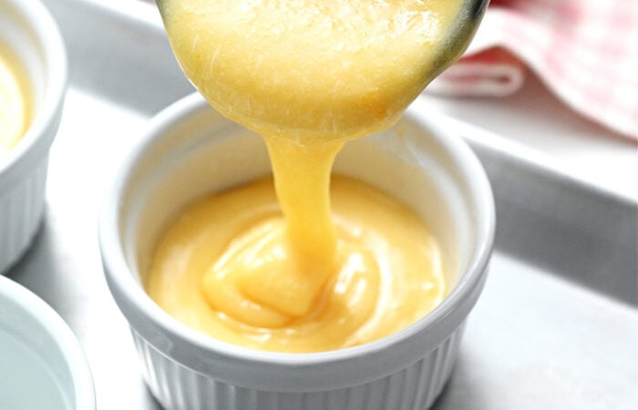 pouring batter into a ramekin