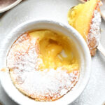 a spoonful of warm White Chocolate Molten Lava Cake