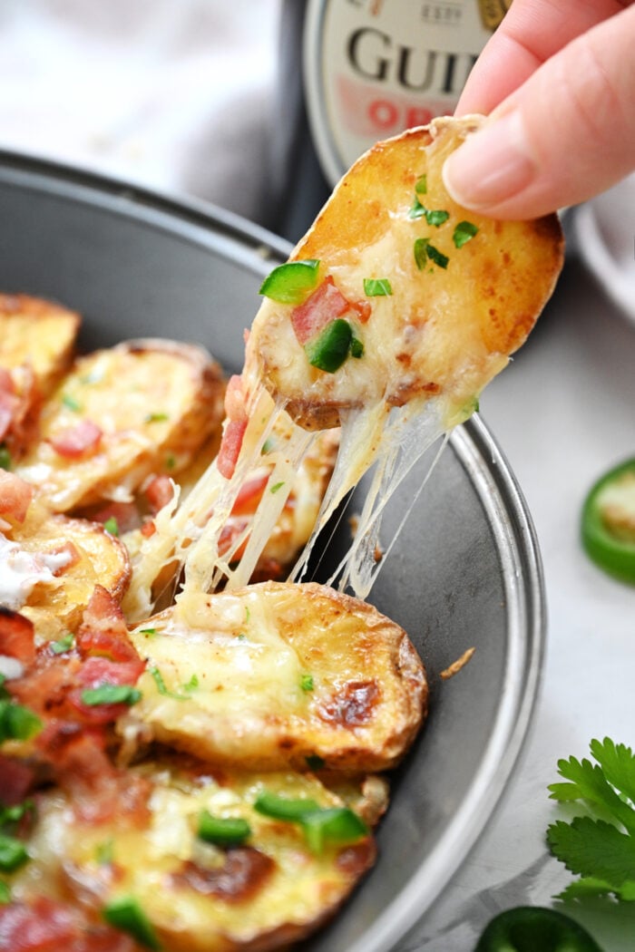 taking a bite of Irish Nacho