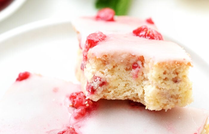 a bite of Raspberry Lemon Bar