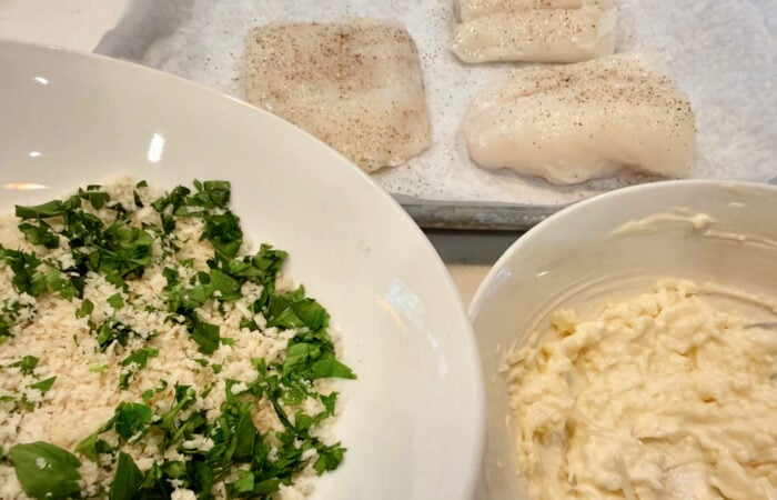 adding mayo and panko to fish