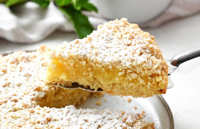 a serving of crumble curd cake