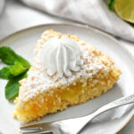 a piece of Lime Curd Cake with whipped cream
