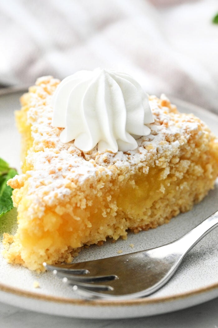 Lime Curd Cake serving with a fork
