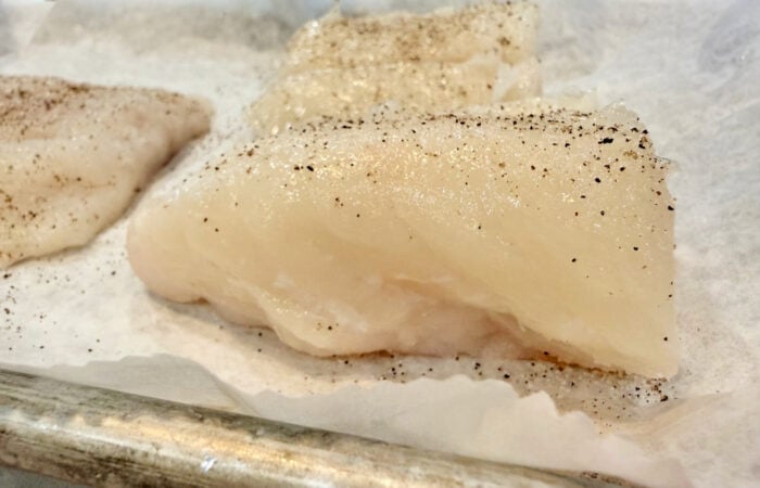 fresh cod with salt and pepper