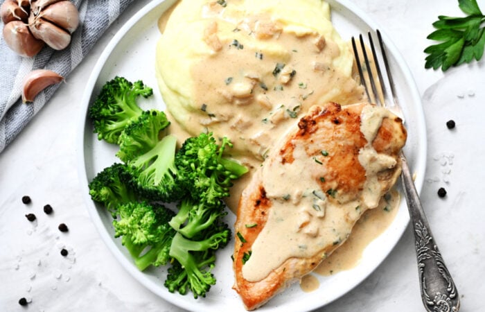 plate of chicken potatoes and broccoli