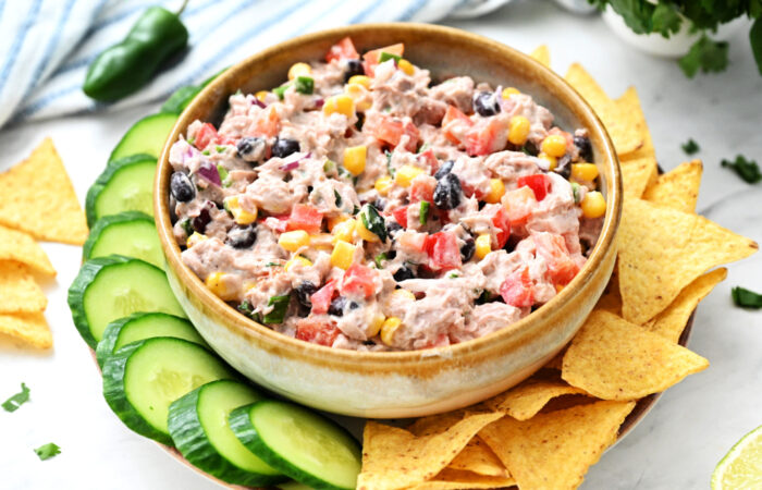 tuna dip with chips and cucumber slices