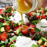 pouring lemon dressing
