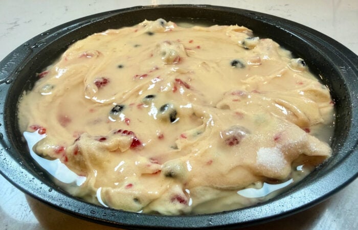 adding boiling water to cake batter