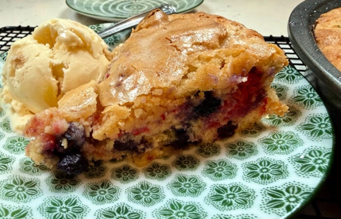 a serving of Berry Coffee Cake with lemon ice cream