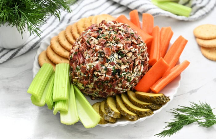 a Dill Pickle Cheese Ball with veggies and crackers