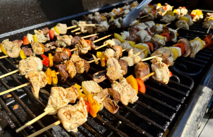 grilling chicken skewers on the Traeger