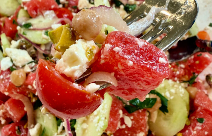 a bite of watermelon salad