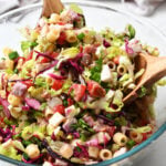 tossing a Ditalini pasta salad