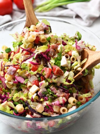tossing a Ditalini pasta salad