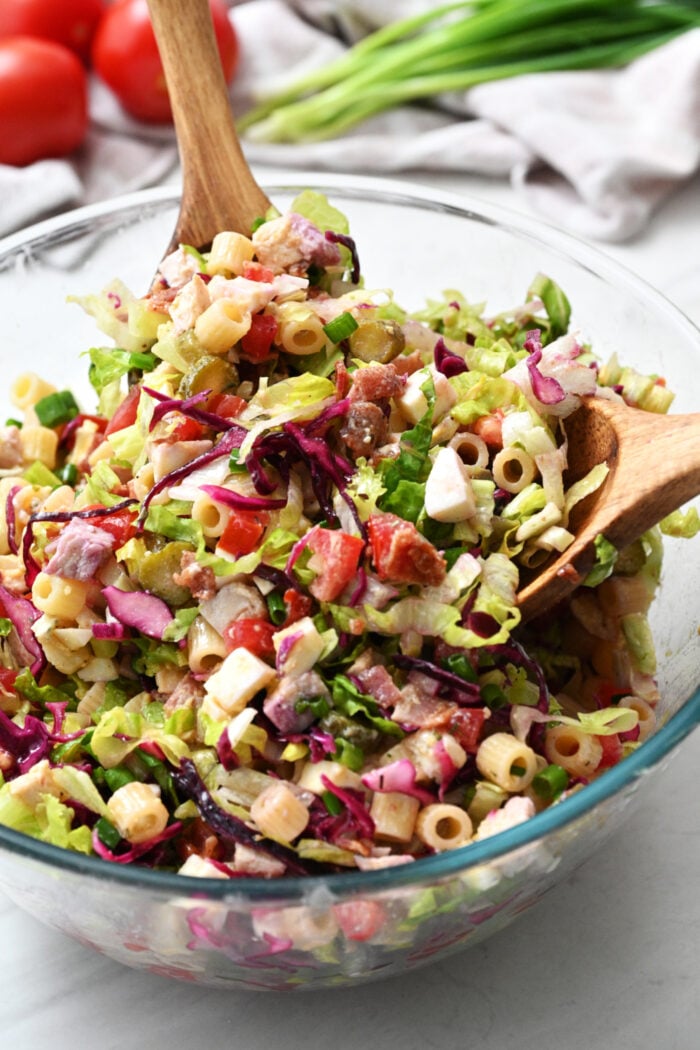 tossing a Ditalini pasta salad