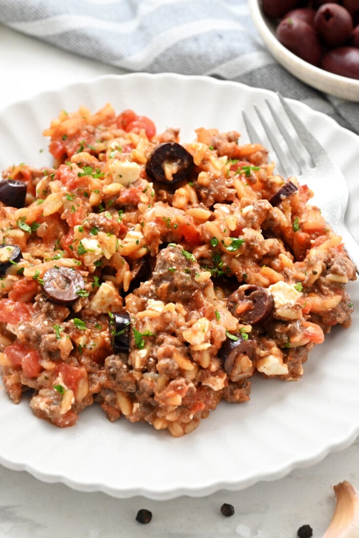 serving of baked orzo dish with ground beef