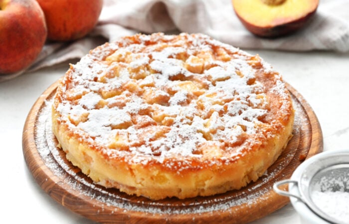 dusting of powdered sugar on cake