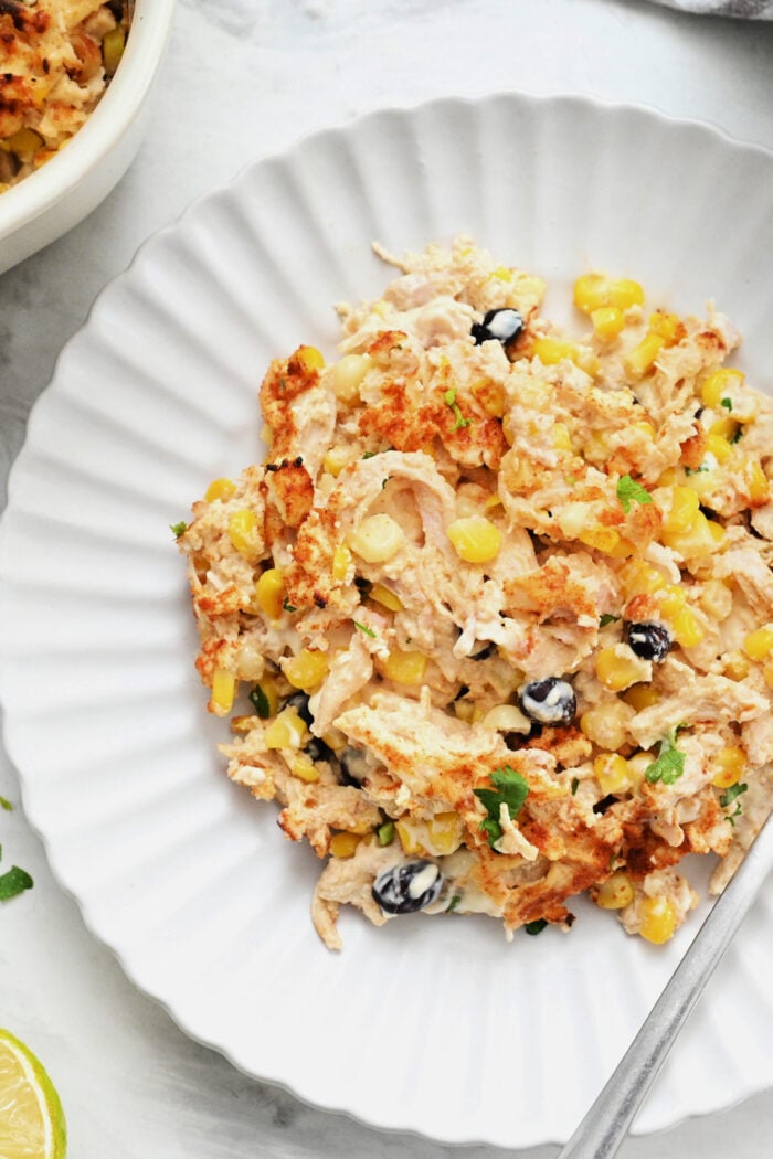 serving Mexican Street Corn Casserole with Chicken