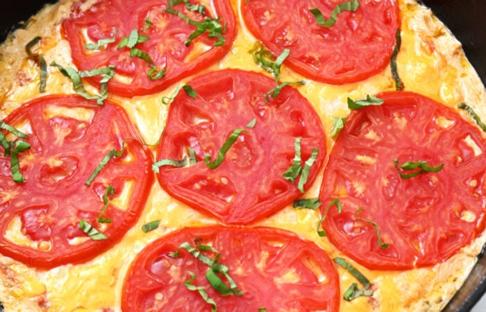 slices tomatoes on dip