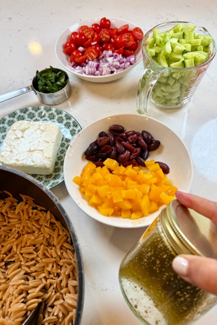 chopped ingredients orzo salad