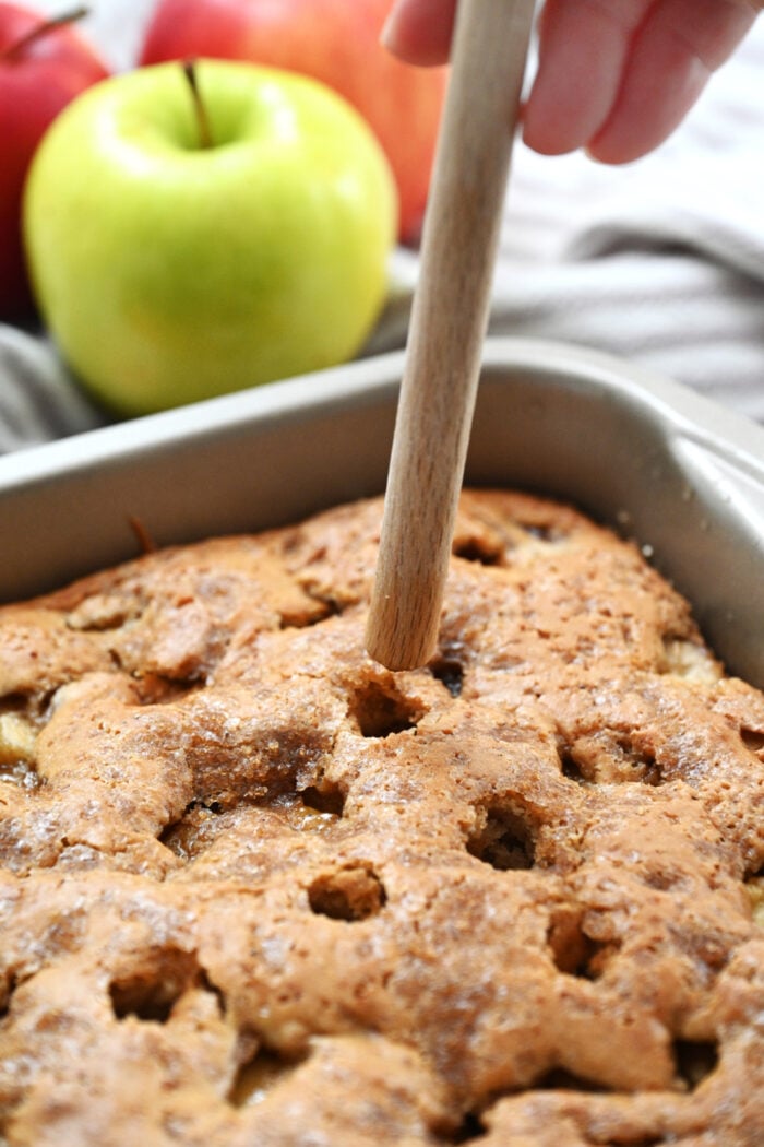 poking holes in cake