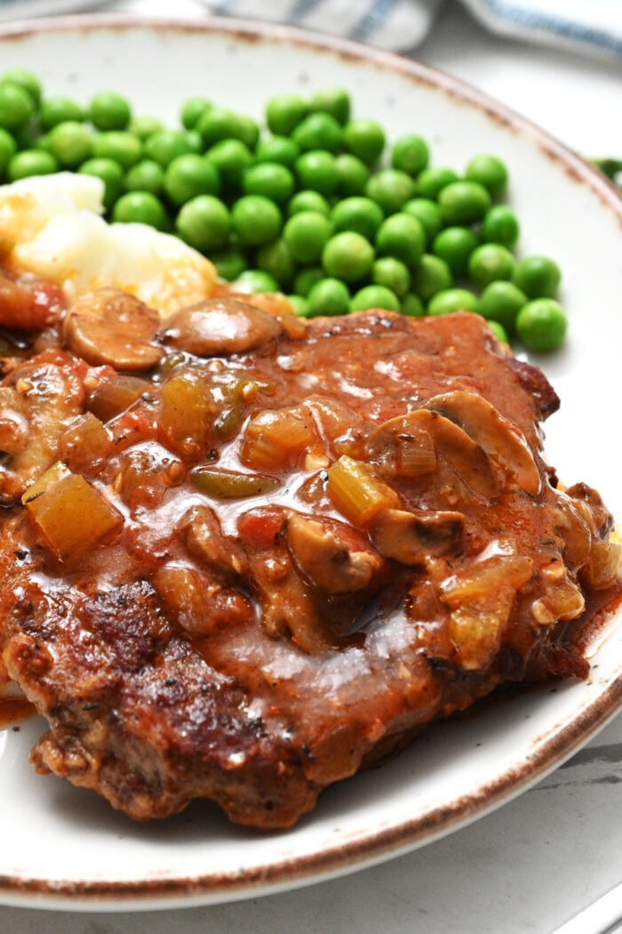 swiss steak with peas